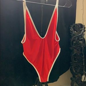 Thong one piece bathing suit